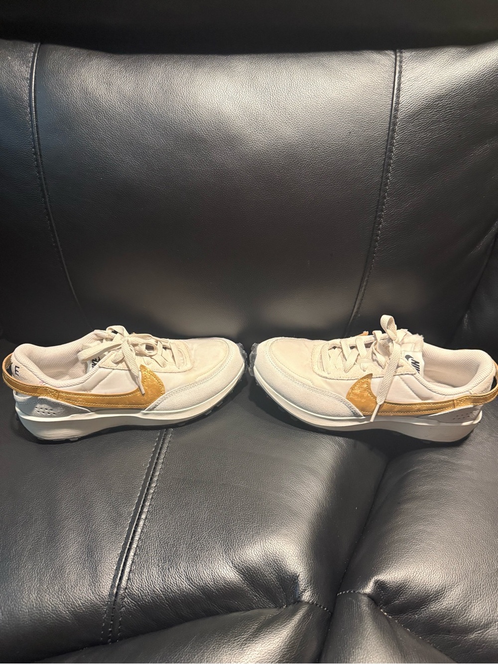 Nike Women's Cream Sneakers with Gold Swoosh